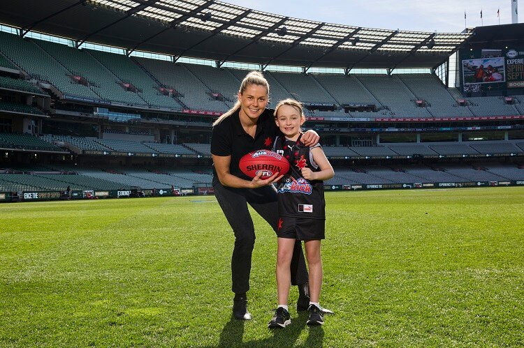 MELBOURNE, AUSTRALIA - SEPTEMBER 23: 2023 NAB AFL Auskicker of the Year Pippa McTaggart poses with Katie Brennan at Melbourne Cricket Ground on September 23, 2023 in Melbourne, Australia. (Photo by Graham Denholm/AFL Photos via Getty Images)