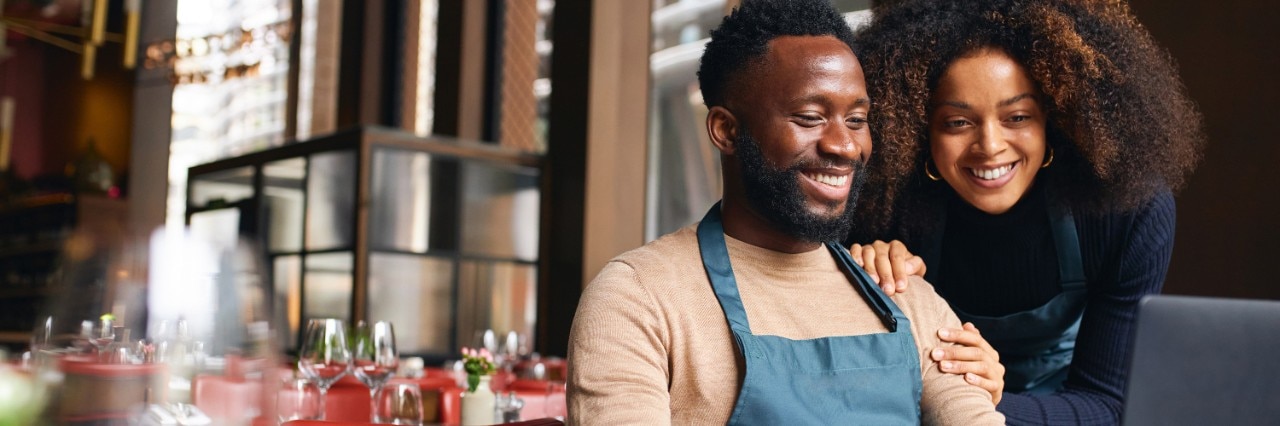 smiling-restaurant-owner-couple-banner-3000x1000.jpg