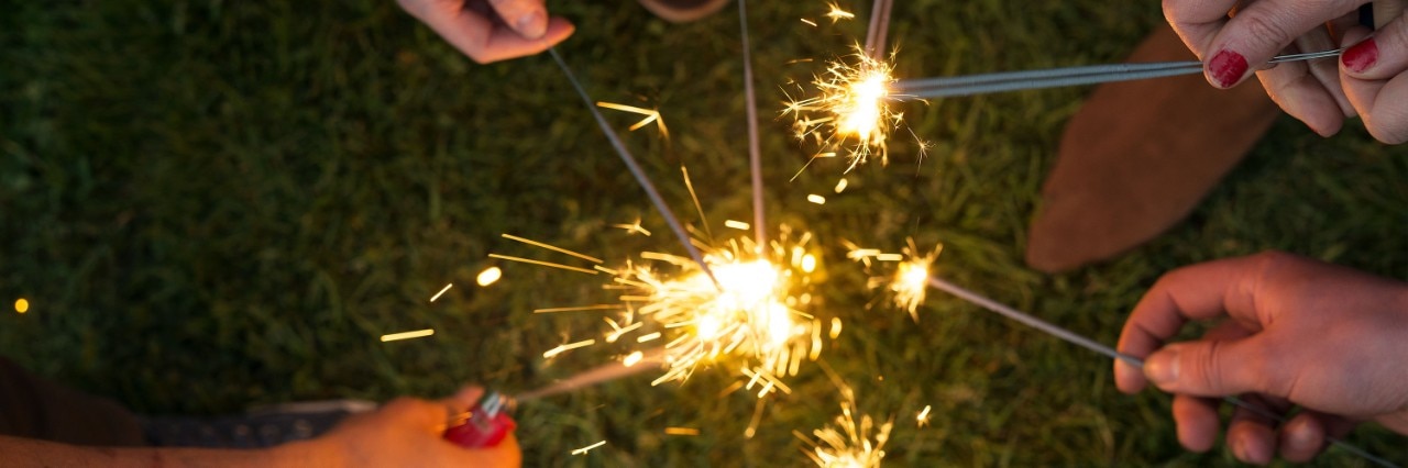 Hands holding sparklers