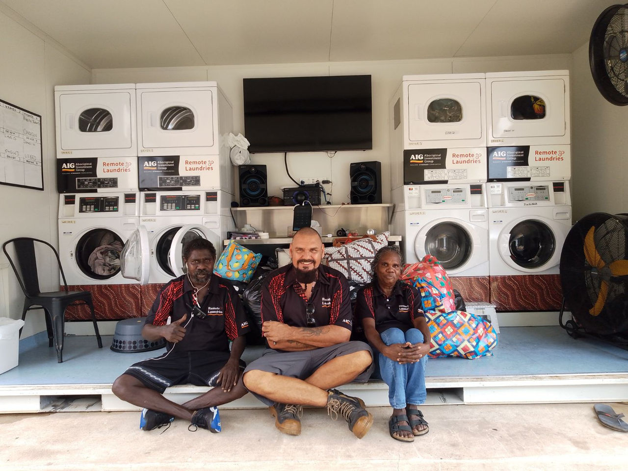 Casuarina Laundry employees, Russell Williams, Sam Autio and Leanne Ariuu