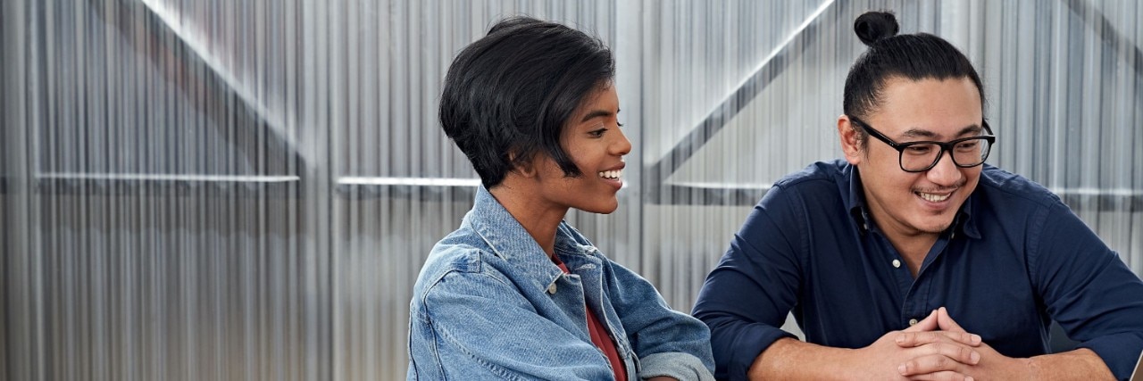 Man and woman laughing