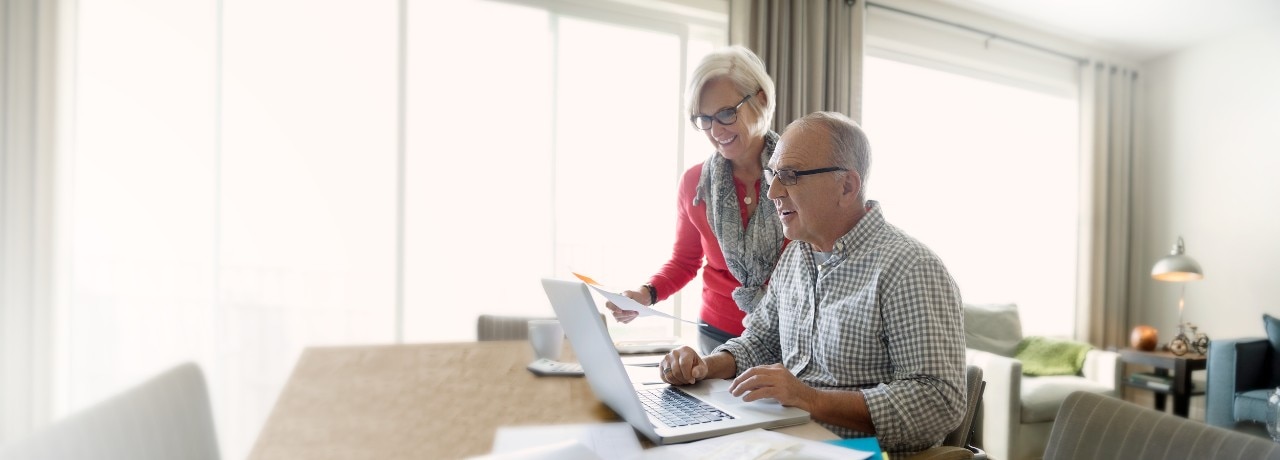 older-couple-planning-on-computer-DigBan-2500x900.jpg