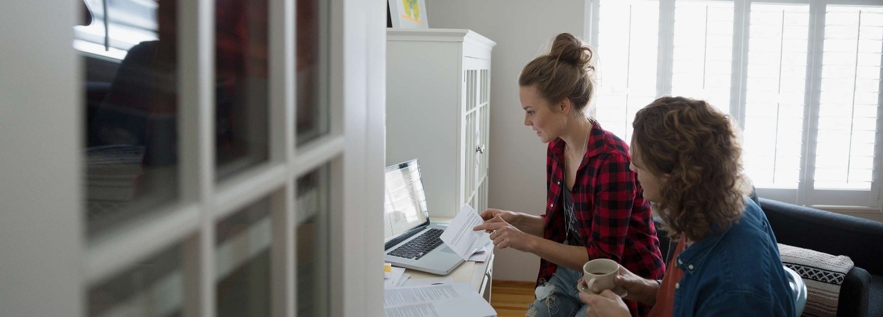 Two women on laptop